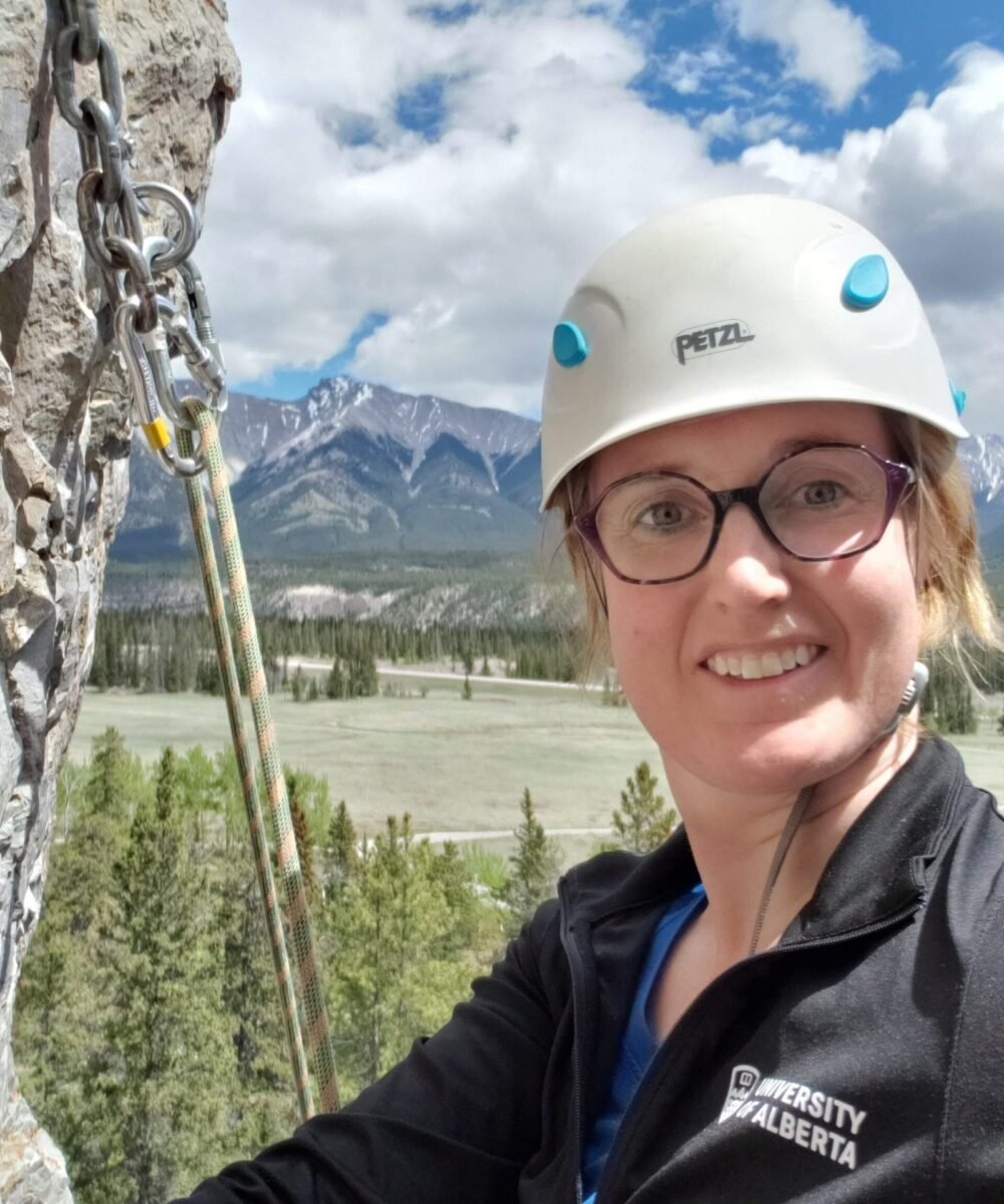 Catherine McLellan rock climbing in the mountains of British Columbia