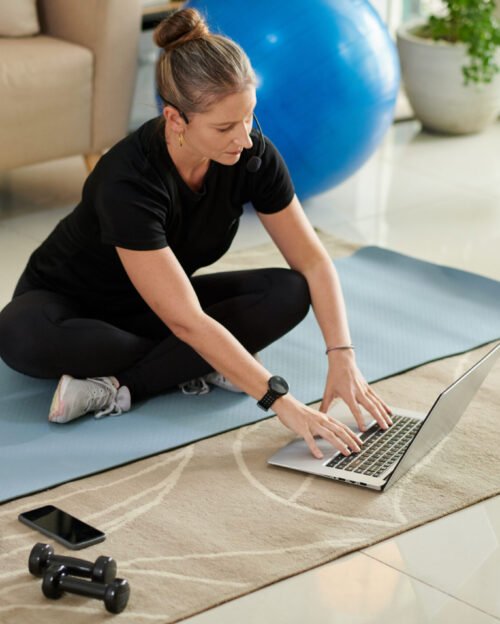 Online fitness trainer answering popular questions of clients